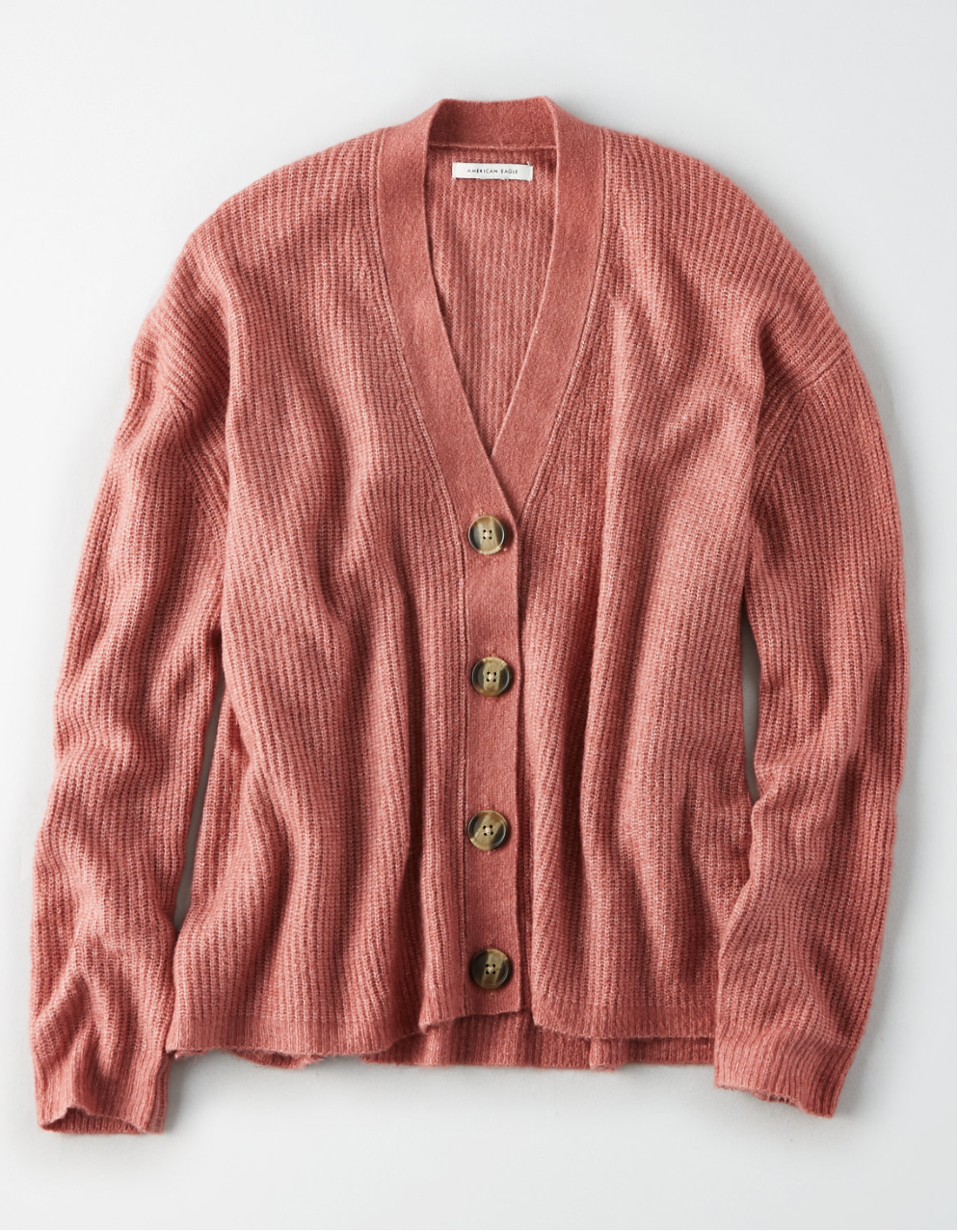 This is a beautiful blush color & to make it better, it is the SOFTEST cardigan I have ever worn. This is so worth it y'all! It also comes in a few other colors.
